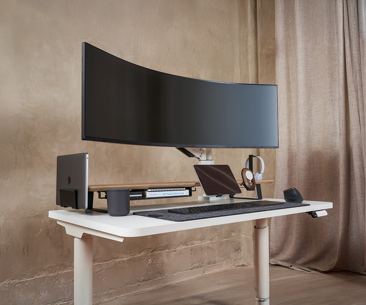 ULTRARM monitor arm and Moodular wooden monitor stand — modular, ergonomic, and designed for VISION ultrawide monitors. Enhances comfort, saves space, and elevates your workspace with precision craftsmanship.
