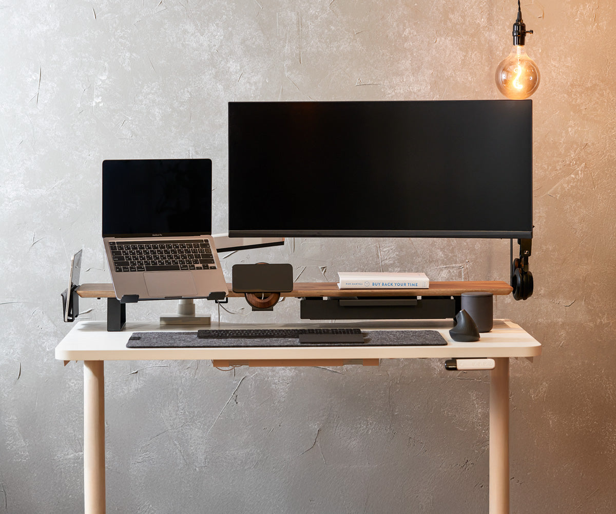 ULTRARM monitor arm and Moodular wooden monitor stand — modular, ergonomic, and designed for VISION ultrawide monitors. Enhances comfort, saves space, and elevates your workspace with precision craftsmanship.