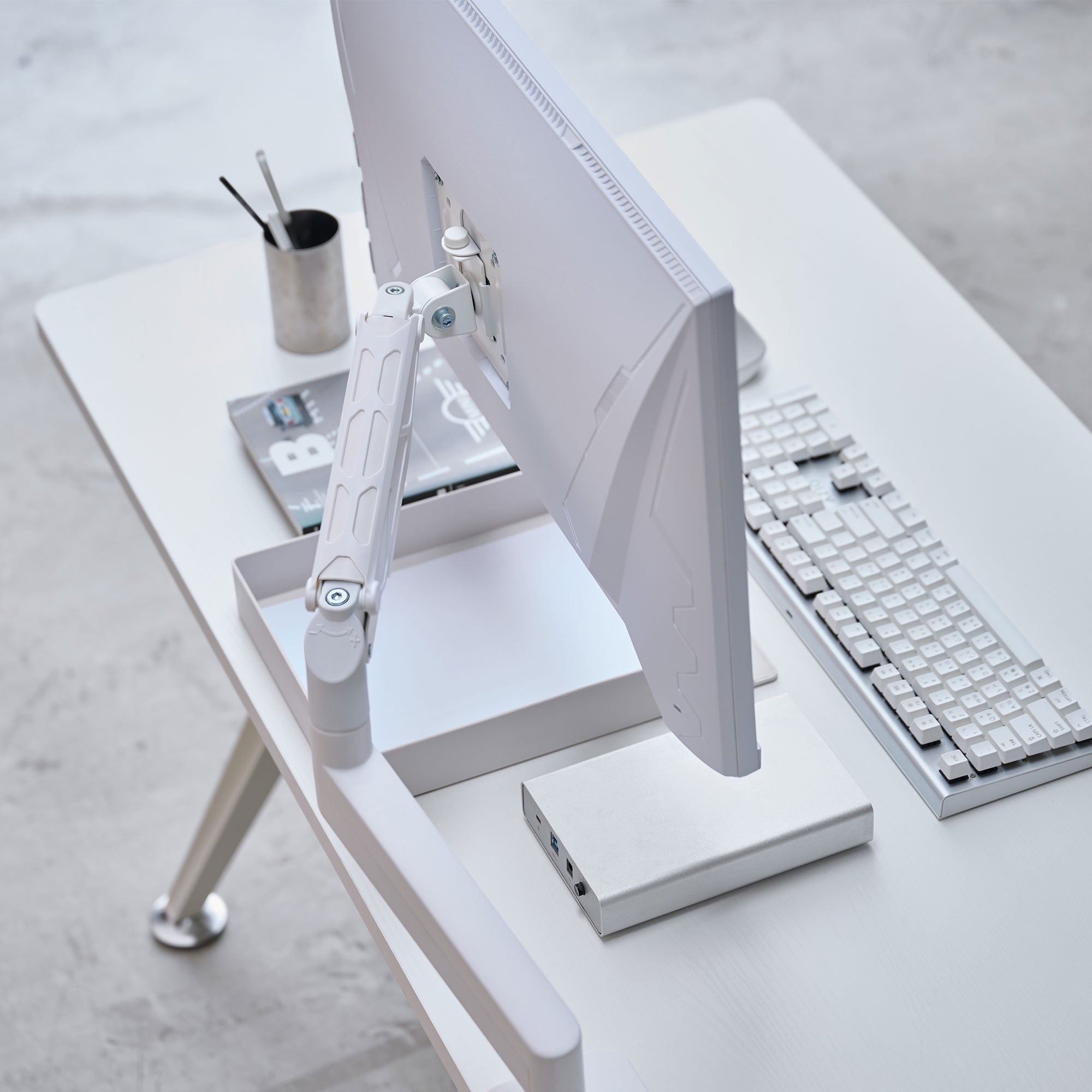 ULTRARM monitor arm and Moodular wooden monitor stand — modular, ergonomic, and designed for VISION ultrawide monitors. Enhances comfort, saves space, and elevates your workspace with precision craftsmanship.